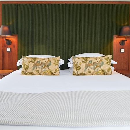 الشقق الفندقية Cheval The Edinburgh Grand المظهر الخارجي الصورة A bed with a mattress