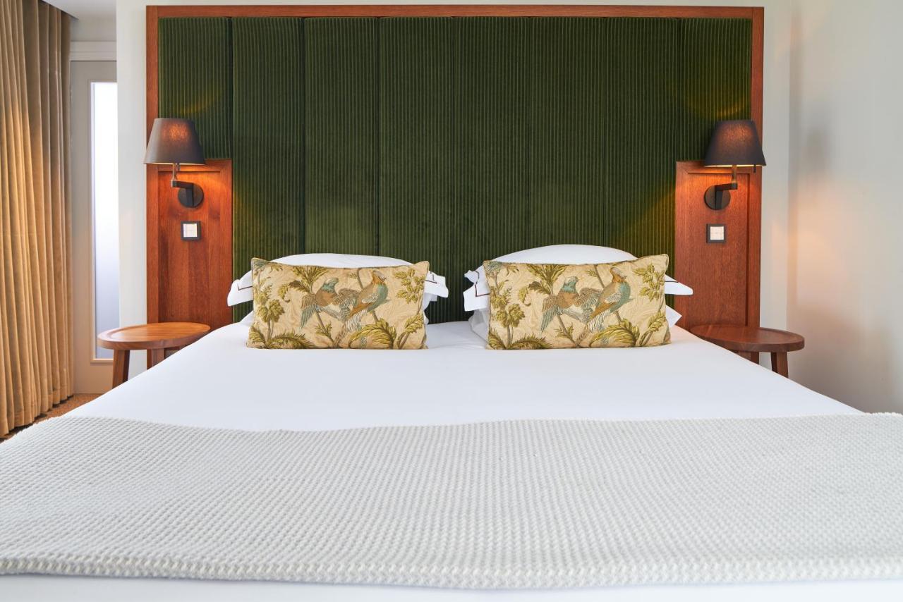 الشقق الفندقية Cheval The Edinburgh Grand المظهر الخارجي الصورة A bed with a mattress